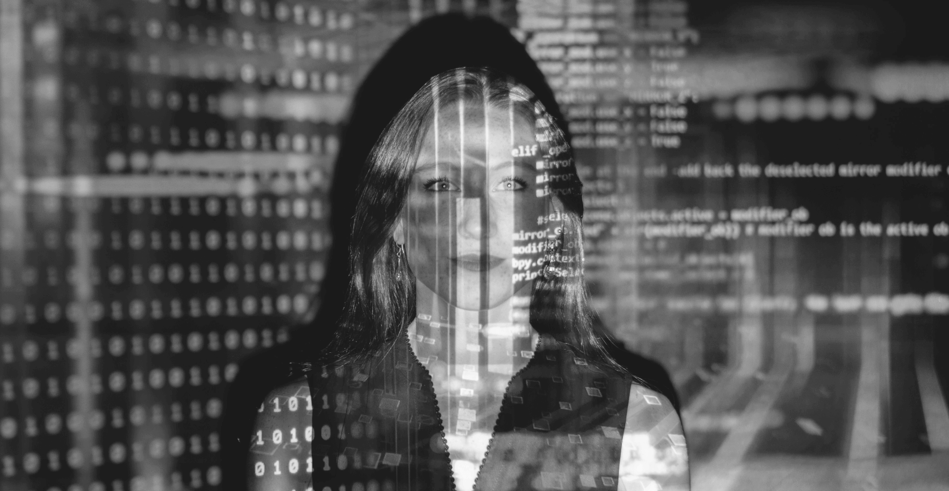 This image of a woman overwritten by code illustrates our discussion topic: Agentic AI, the relevance of autonomous phishing for modern businesses, and how to tackle it with Digital Risk Protection.