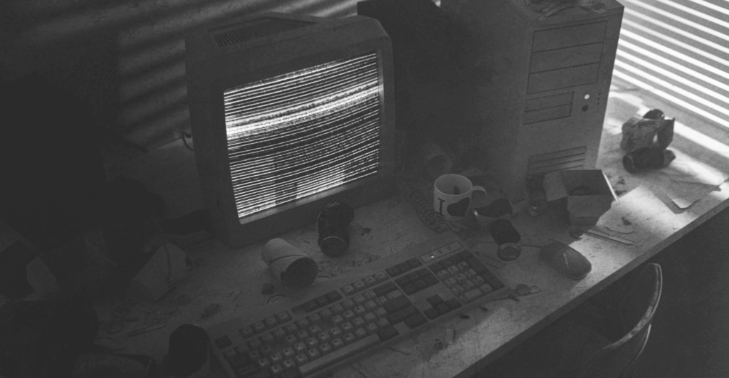 This image of a glitchy computer desk illustrates our discussion topic: multi-channel brand protection.