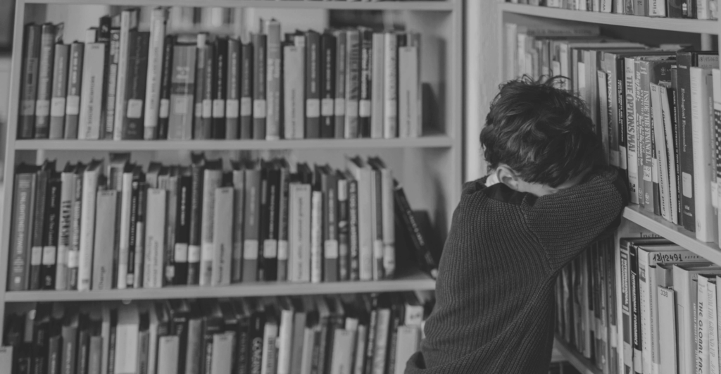 This image of a crying schoolchild illustrates our discussion topic: Back to school scams.