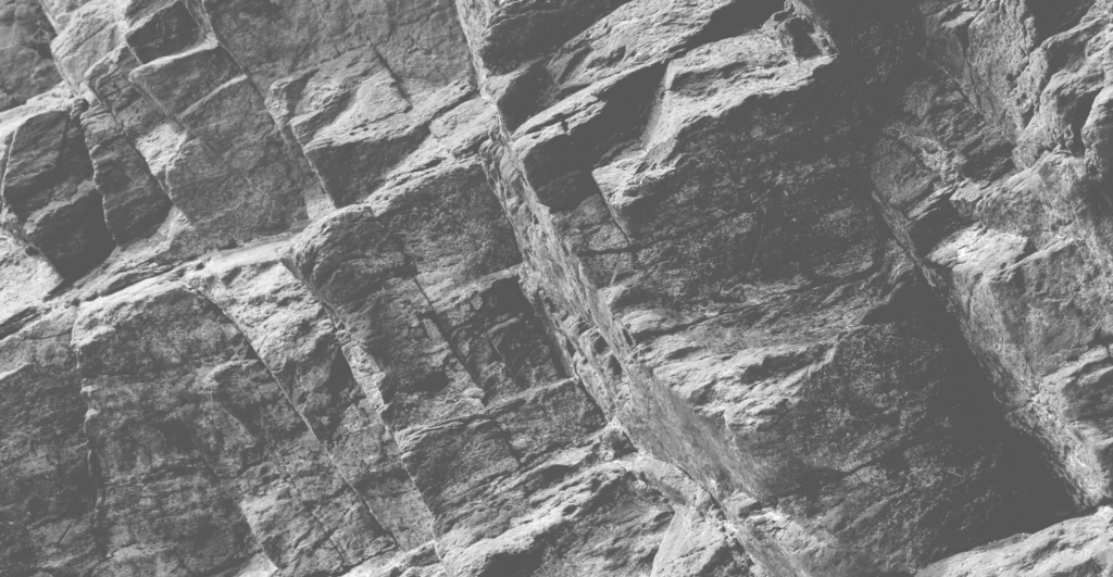 This wall of rock, the kind of which castles are made from, illustrates our discussion topic: How domain name services help you to defend against cyberattacks.