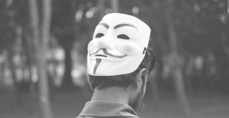 This image of a mask on the back of someone's head illustrates our discussion topic: generative ai and brand protection.