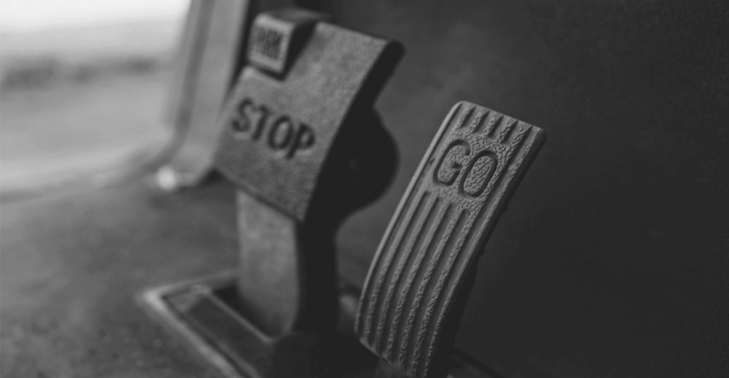 This image of a stop and go pedal in a vehicle illustrates our discussion topic: Objection handling for ICANN's new domain registration phase.