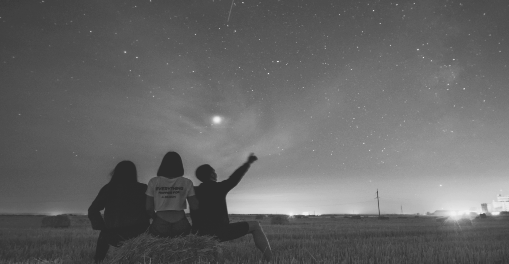 This image of children stargazing highlights our discussion topic: Lisa Deegan's insights around proactive cyber threat security.