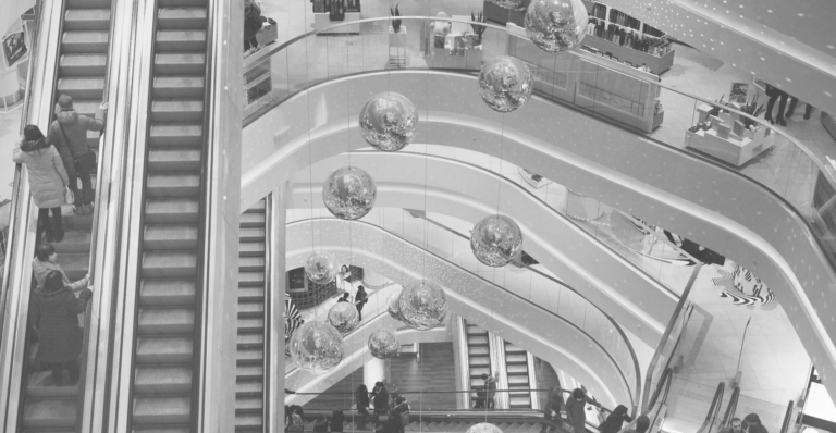 This image of a shopping centre / mall illustrates our discussion topic: How a cyberattack on a UK retailer affects profits, and how to protect your brand.